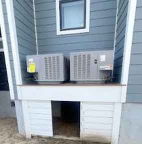Newly installed residential HVAC condenser units by L.F. Fenimore Plumbing and HVAC in South New Jersey.