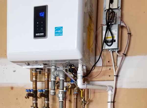 High-efficiency Navien tankless water heater installation with copper piping by L.F. Fenimore Plumbing & HVAC in South Jersey.