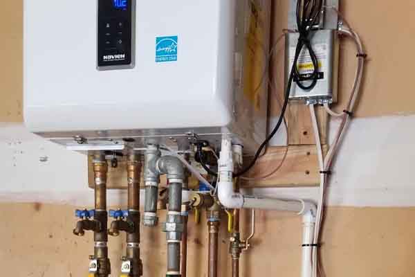 NCB Combi-boiler Navien tankless water heater installation with copper piping by L.F. Fenimore Plumbing & HVAC in South Jersey.